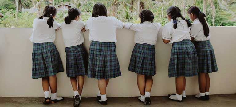 Can a school force the female students to wear short skirts